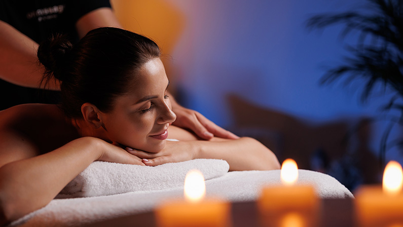 Close-up hands of professional masseuse working, massaging woman's hand in spa salon, therapeutic massage for relaxation. Healing, beauty, health, lifestyle, peace, relief, professional skills.