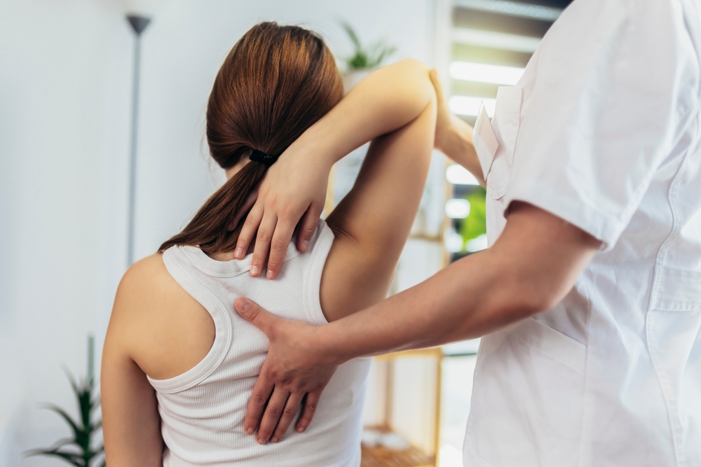 Teen Girl having chiropractic back adjustment